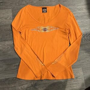 Harley Davidson orange long sleeve shirt with bedazzles on front with v neck sty